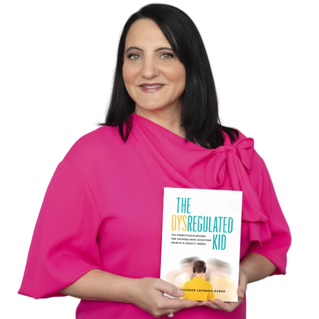 Dr. Roseann Capanna-Hodge holding The Dysregulated Kid book
